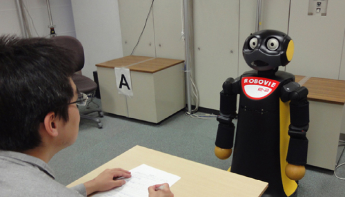 Robot tutoring a student photo